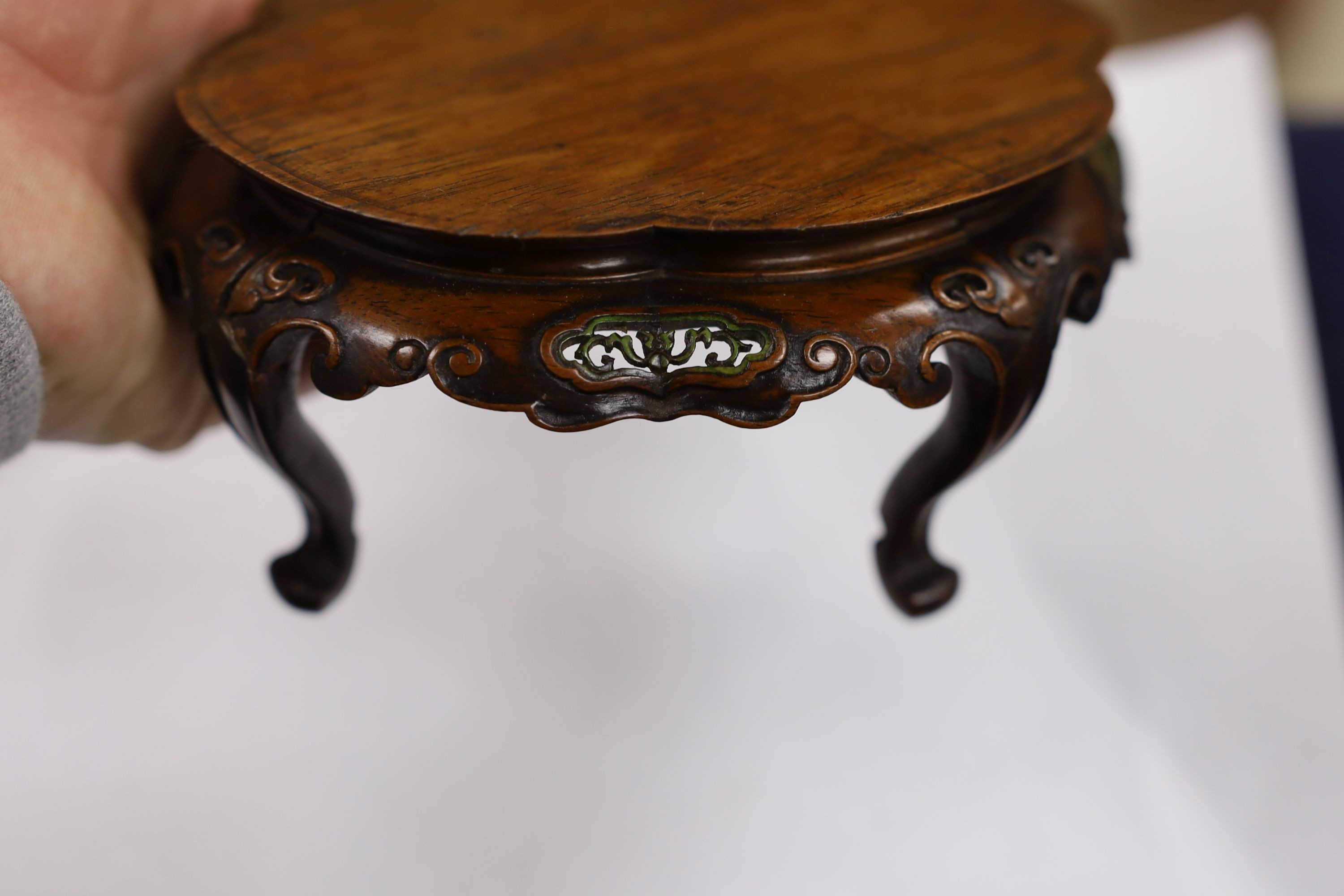 A fine Chinese oval hardwood and green stained Ivory inset stand, Qing dynasty, lacking stretcher, 15 cms wide.